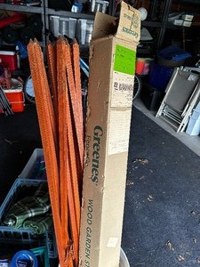 lot 408 image: Bucket Filled With Greenes Fence Co, Wood Garden Stakes