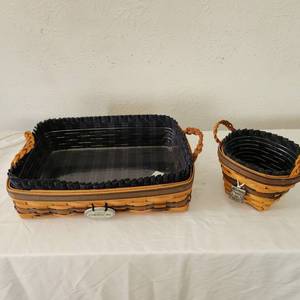 lot 7 image: 2 Vintage Longaberger Baskets 1st 14 By 10 12 By 2 12 Deep 2nd 5 12 By 4 12 By 4 Inches Deep Both Our Collectors Club Baskets With Sleeve And Protector.