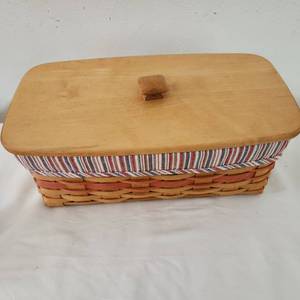 lot 10 image: Vintage Longaberger Basket 3rd 13 34 By 6 12 By 5 Inches Deep With Cover Includes Sleeve And Divided Protector.