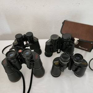 lot 15 image: Four Pair Of Vintage Binocular.