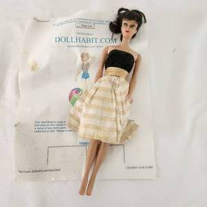 lot 17 image: Vintage Barbie Doll.