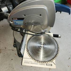 lot 424 image: Ryobi Miter Saw With 2 Blades.