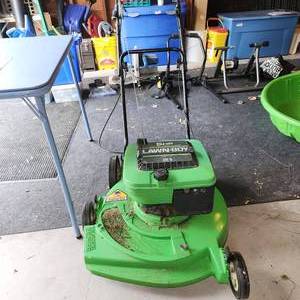 lot 425 image: Lawn Boy 21  Lawn Mower With Gas Can.