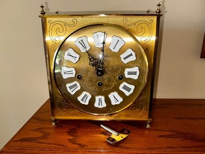 lot 29 image: Howard Miller Full 44 Westminster Chiming Mantel Carriage Clock Made In Holland with Winding Key Valued at $750