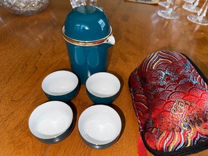 lot 38 image: Ceramic Travel Nesting Tea Set