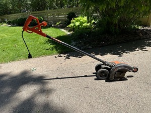 lot 303 image: Black & Decker 2-in-1 Electric Landscape EdgerTrencher