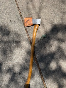 lot 310 image: Vintage Craftsman Wood Splitting Axe with Custom Leather Cover