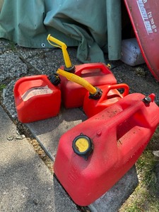 lot 320 image: Four Gas Cans of Various Sizes