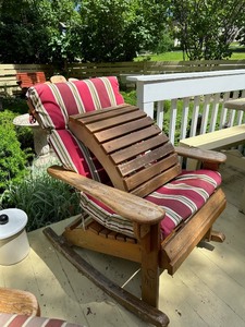 lot 327 image: Pair of Custom Handmade Patio Chairs with  Cushions, Footrest, and Covers One Rocking 34in x 29in x 40in