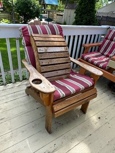 lot 328 image: Custom Handmade Patio Chair with Cushion, Footrest, and Cover 34in x 29in x 40in