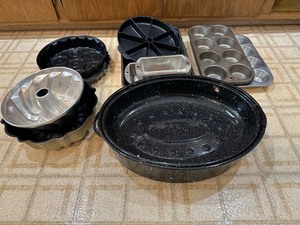 lot 75 image: Assortment of Baking Dishes - Muffin Tin, Bundt Cake, Bread Pans, Baking Trays, Cooling Racks, NordicWare Scottish Scone & Cornbread Pan & More