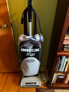 lot 107 image: Oreck Vacuum Cleaner - Working Condition with Extra Filter