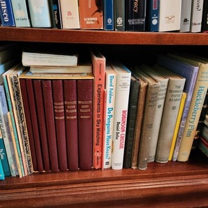 lot 104 image: Variety of Books on Shelf including McGuffeys Third Eclectic Reader, Revised Edition