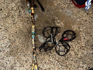 lot 259 image: Yak Trax Clamp On Hiking Spikes and Walking Sticks with Minnesota State Park Medals
