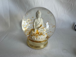 lot 31 image: Buddha Snow Globe
