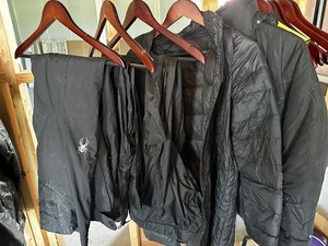 lot 77 image: Womens Winter Jackets,  Spyder Snow Pants Size 8, & Rain Pants Size M and XL