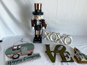 lot 16 image: Miscellaneous Decor USA Nutcracker, Happy Camper Wall Hanger, & XOXOLove Decor