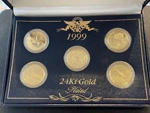 lot 41 image: 1999 24K Gold Plated State Quarters