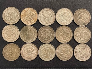 lot 149 image: Mexican Silver Pesos