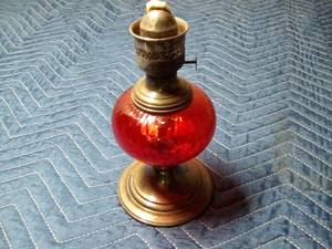 lot 193 image: Red glass oil lamp