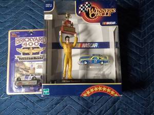 lot 109 image: 1980 Dale Earnhardt Figurine, trophy & car and 1994 Motor Speedway car
