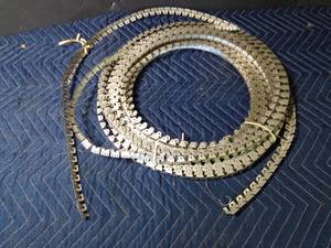 lot 279 image: Flexible Upholstery metal tack strip