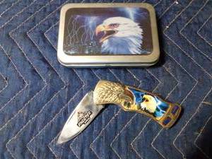 lot 284 image: Eagle knife in tin