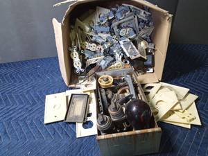 lot 289 image: Box of electrical switches and plug-ins, plate covers and more