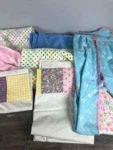 lot 398 image: Knitted Baby Blankets, Hanging Diaper Organizer, Pillow Cases & More