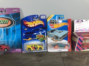 lot 404 image: Lot of Die Cast Vehicles in the Original Packages