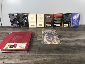 lot 427 image: 7 Books (Star Trek-Star Wars-Back To the Future-Dragonogy) - 2 VHS Tapes (Star Wars) - 1 Comic Book (Young Blood Strike File)