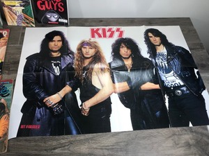 lot 431 image: KISS Poster - 3 Dynomite Magazines - The Complete Peanuts Comic Book Strips - Def Leppard Magazine & More