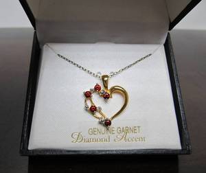 lot 23 image: Gold over Sterling Silver Garnet Encrusted Heart Pendant Necklace