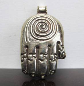 lot 36 image: Large Tibetan Silver Hand Pendant