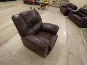 lot 10 image: Plush leather recliner- mint condition