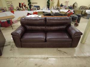 lot 13 image: Plush leather couch-great shape