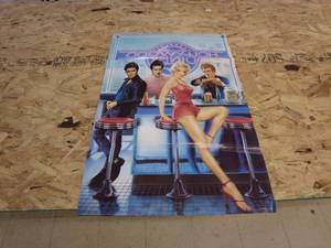 lot 83 image: Retro Hollywood Diner Poster Featuring Iconic Figures