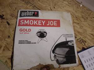 lot 87 image: Weber Charcoal Grill- new in box