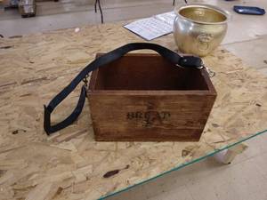 lot 91 image: Wooden box with strap