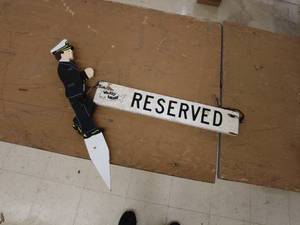 lot 252 image: Wooden RESERVED Sign with Captain Figurine