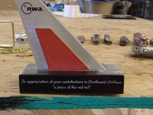 lot 358 image: Vintage Belt Buckle, NorthWest Airlines, pocket knives