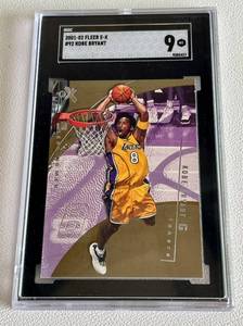lot 15 image: Kobe Bryant SGC 9 Mint 2001-02 Fleer E-X #92 Basketall Card