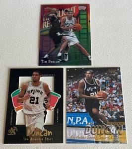 lot 45 image: Tim Duncan 3 Card RC and Insert Lot - 1999 Skybox Centry EX #3, 2000 Topps ChromeHighlight Reel #HL10, 1997-98 Fleer RC #201 Basketballl Cards Rookie