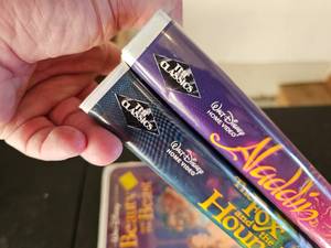 lot 93 image: Collectible The Classics Black Diamond Disney Classics VHS Tapes, etc