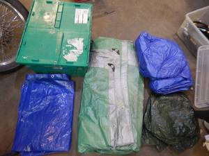 lot 26 image: tote of tarps big and small