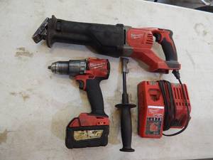 lot 13 image: Milwaukee M18 fuel 12 in hammer drill, Sawzall with 5.0 battery and charger
