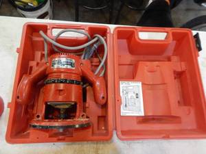lot 15 image: Makita router with case