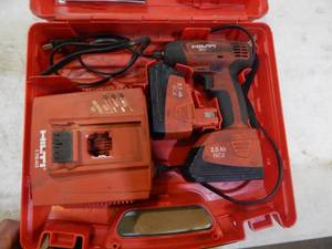 lot 20 image: Hilti SW 121-a half inch impact with two batteries charger and case