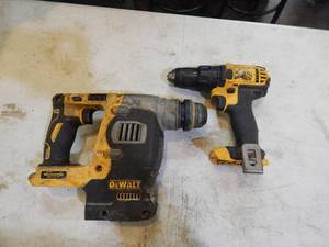 lot 27 image: DeWalt 20 volt brushless hammer drill and half inch drill driver