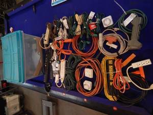 lot 93 image: Tote full extension cords multi plugs and more